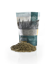 Load image into Gallery viewer, CBD Hemp Pellets displayed loose in front of a package of the Hemp Pellets
